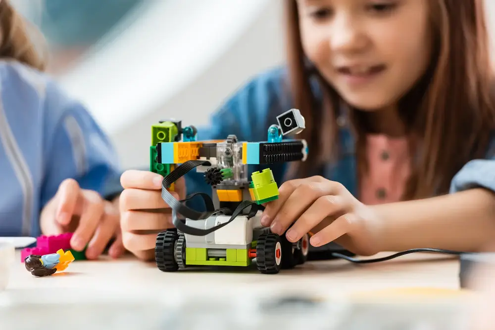 A student building a robot