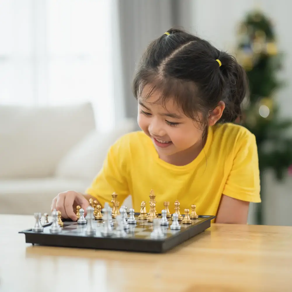 A girl playing chess